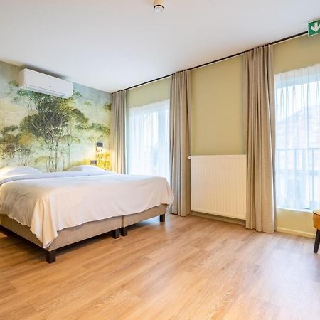 Appart Hotel En Ville Bastogne Bagian luar foto