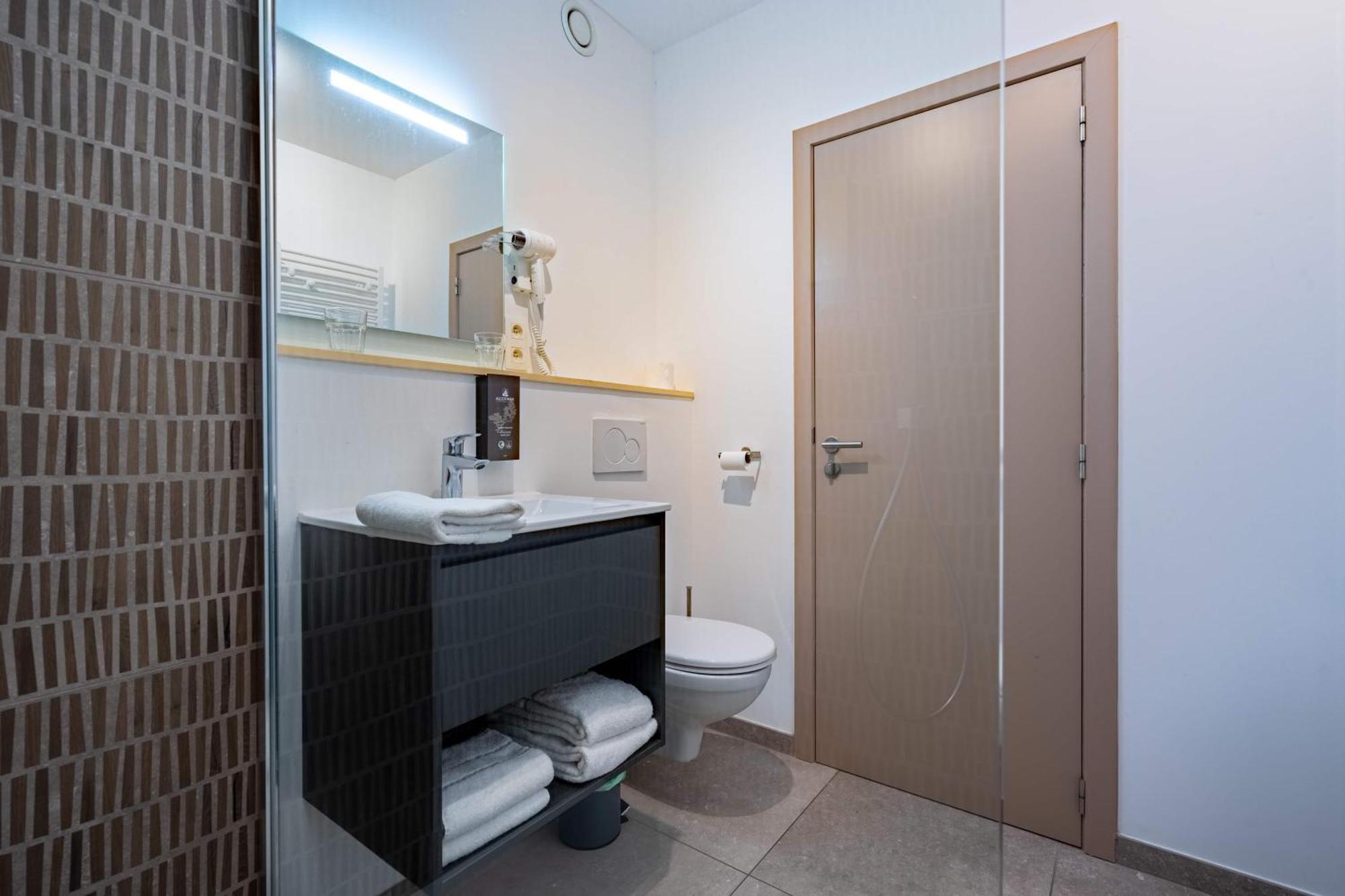 Appart Hotel En Ville Bastogne Bagian luar foto